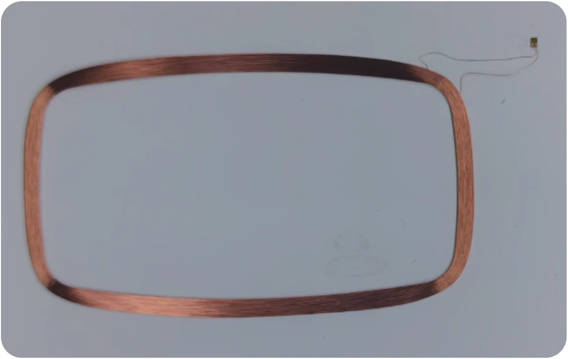 Wire-wound antenna inlay